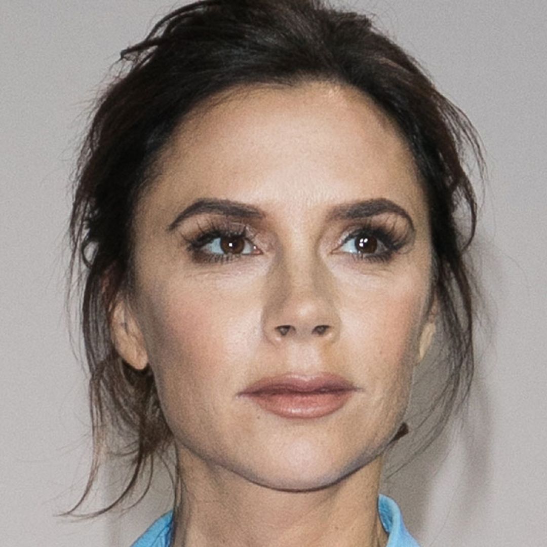 Victoria Beckham is a vision in romantic midi dress