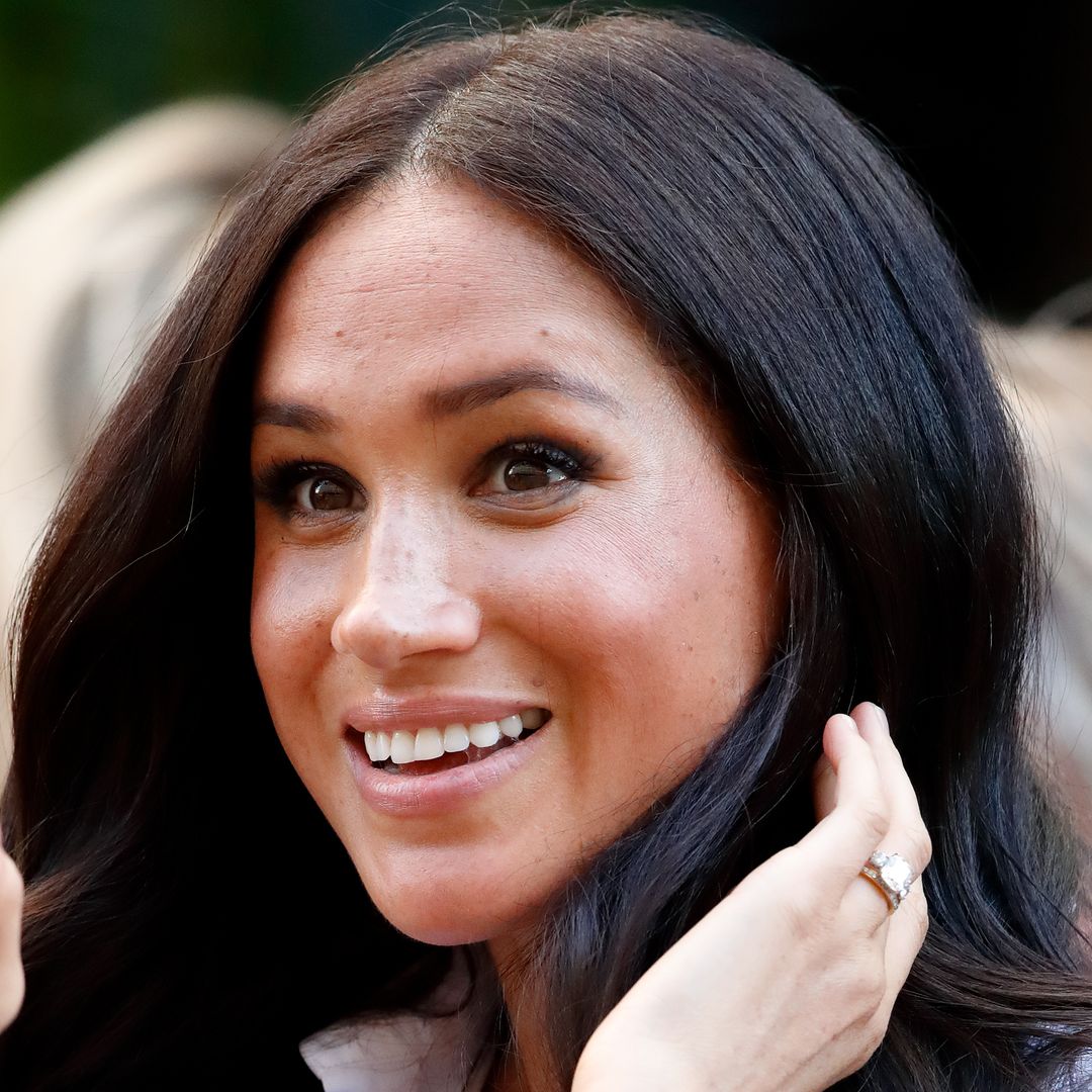 Meghan Markle's 'emotional' tribute in white halterneck gown – in autumn