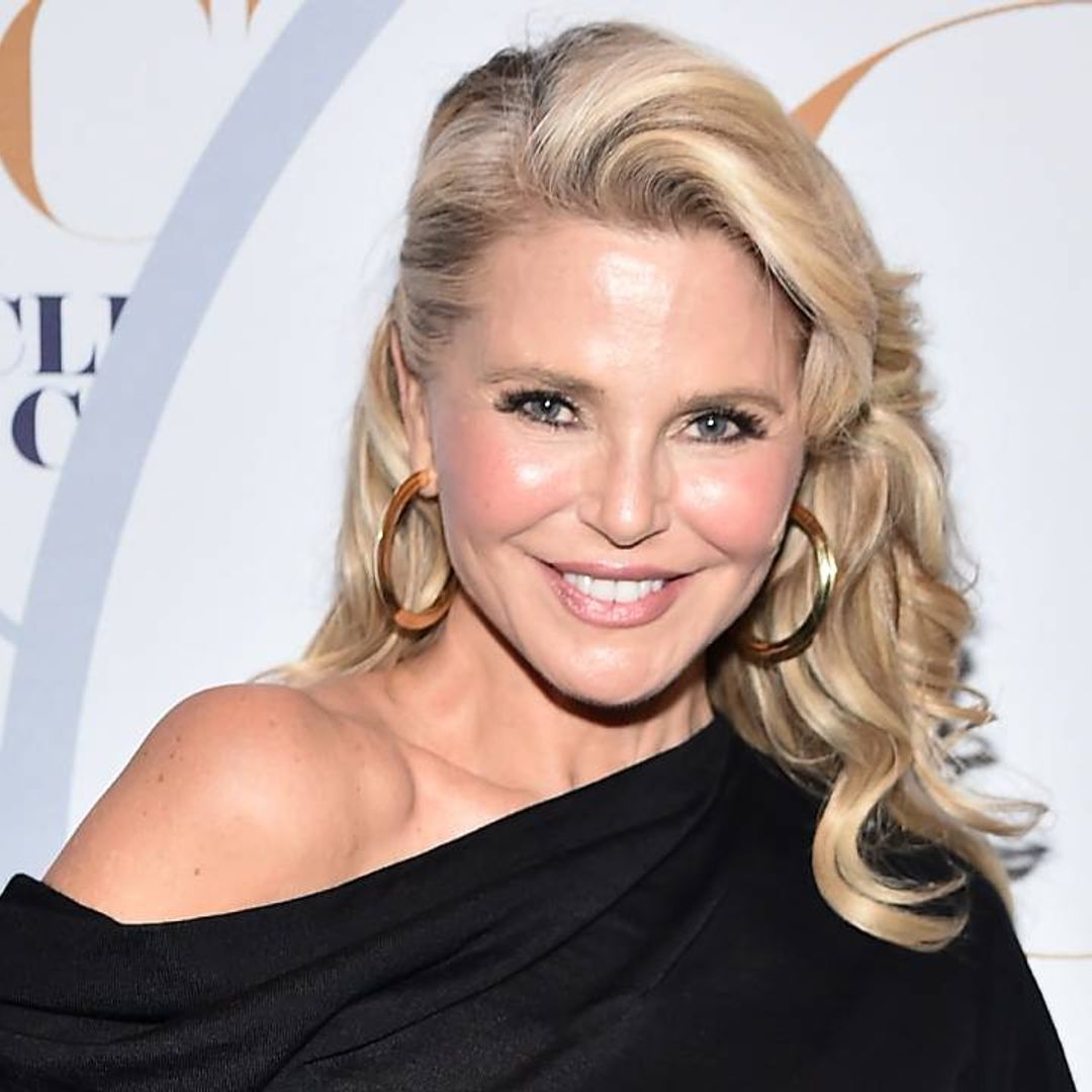 Christie Brinkley smoulders in a mesh swimsuit for flirty throwback photo