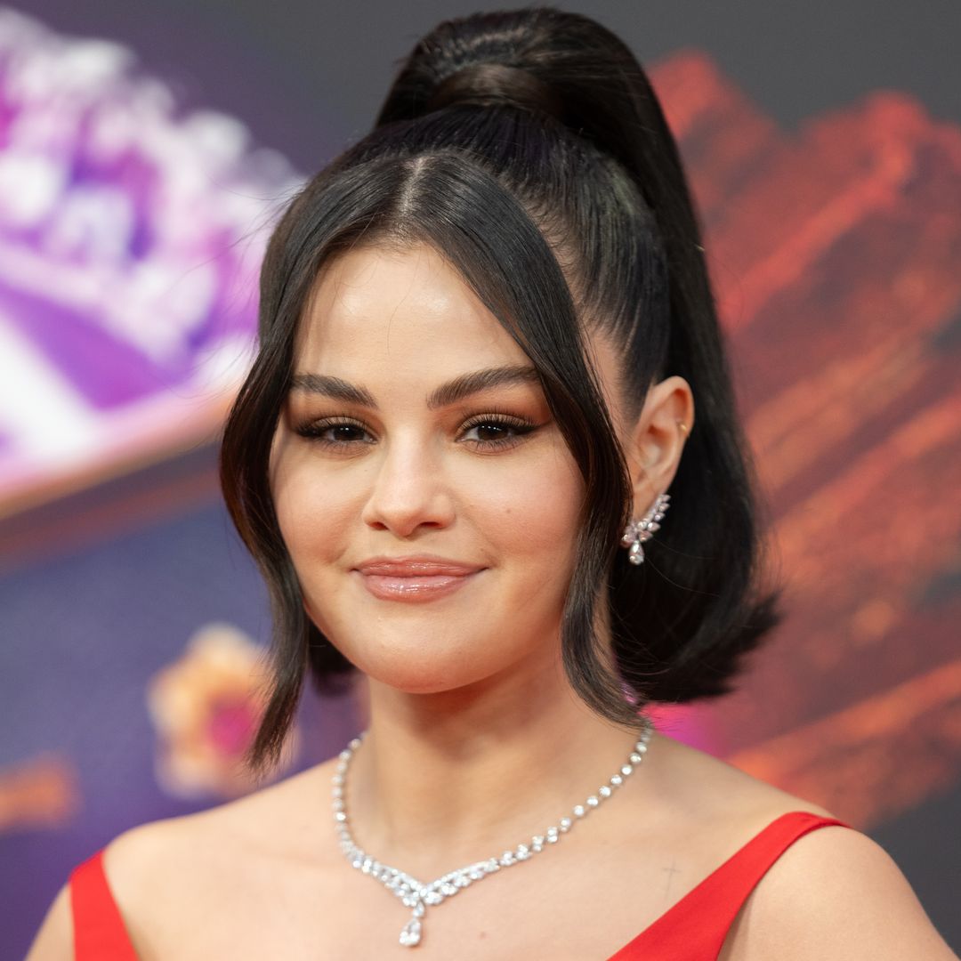 Selena Gomez can't get enough of this one crochet mini dress