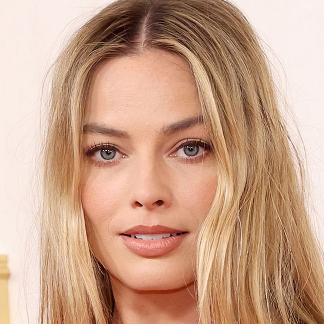 Margot Robbie is angelic in Victoria Beckham mini dress
