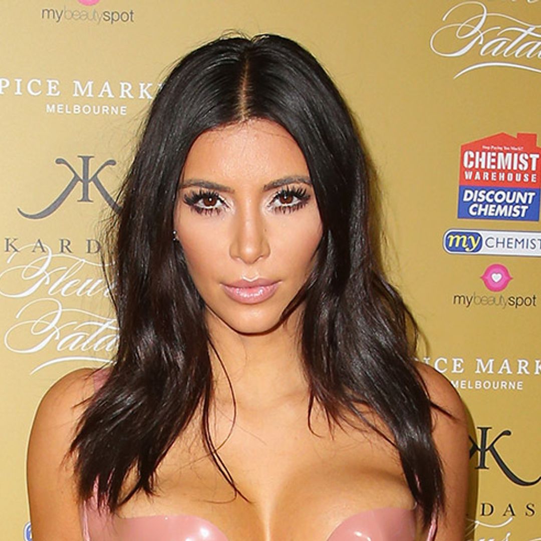 Kim Kardashian shows off flawless tan in revealing snap