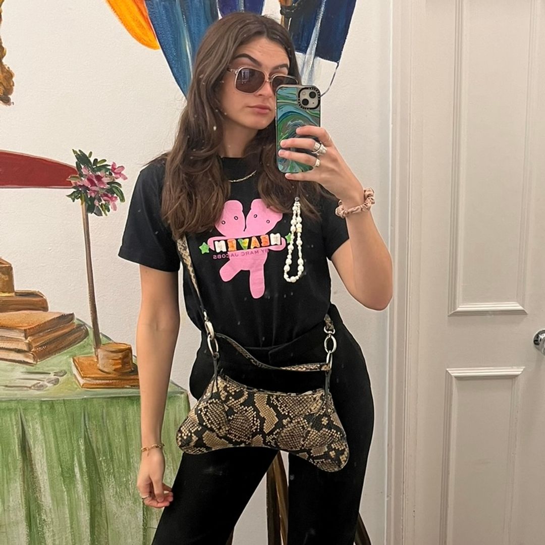 girl in black tee with gummy bear print