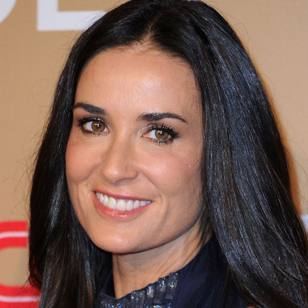 Demi Moore, 60, wows in buttoned-down shirt and high heels for jaw-dropping throwback photo