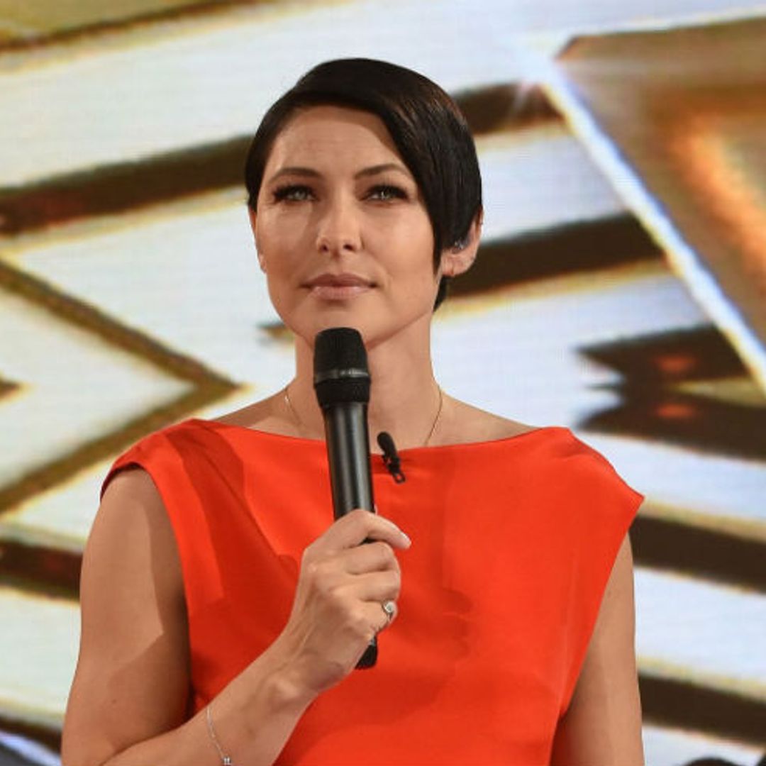 Emma Willis is the lady in red while undertaking presenting duties