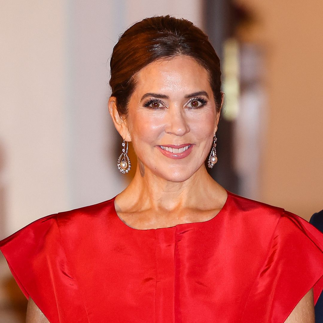 Queen Mary of Denmark is a satin dream in royal red ballgown | HELLO!