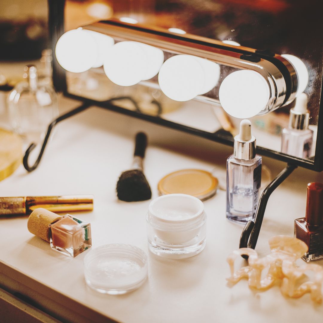 Dressing table with makeup on it 