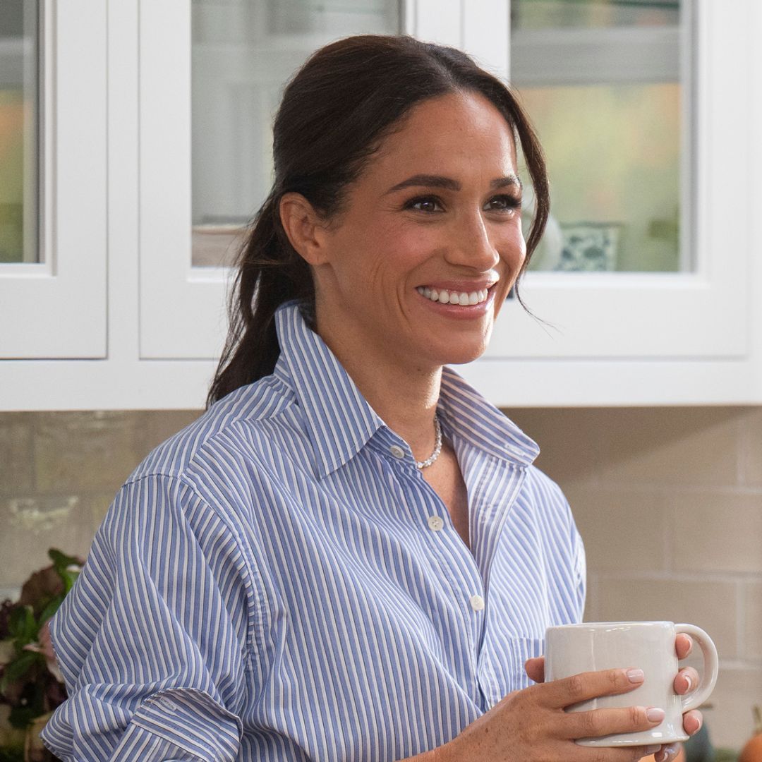 Meghan Markle rocks skinny jeans in 'elevated' look for barefoot beach stroll in unseen photos