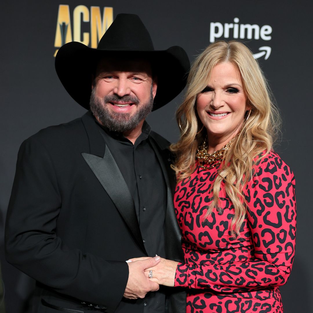 Garth Brooks' wife Trisha Yearwood displays incredible slimmed-down physique in mini dress and fishnet tights