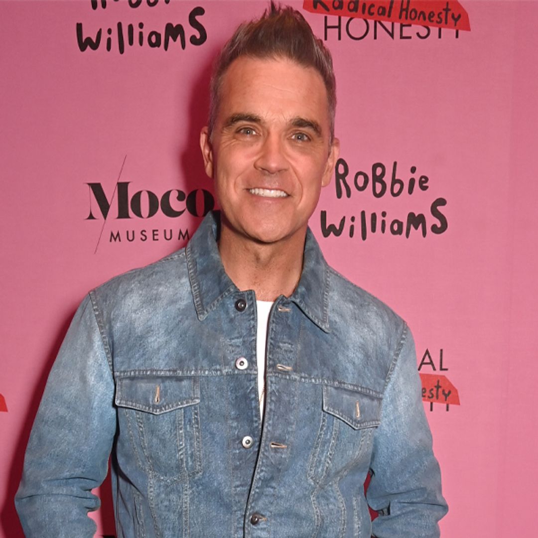 Inside Robbie Williams' eccentric art launch with wife Ayda and daughter Teddy, 12