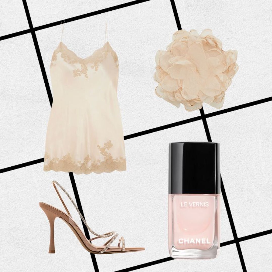 Honeymoon outfit consisting of lace chemise, floral choker, clear heels and pale pink nail polish 