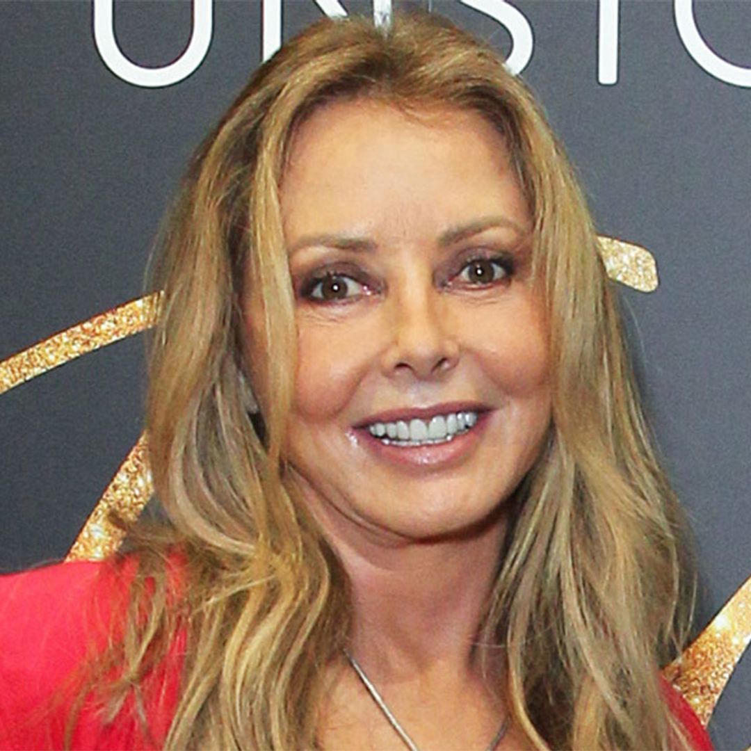 Carol Vorderman poses up a storm in fiery red gown for candid new post