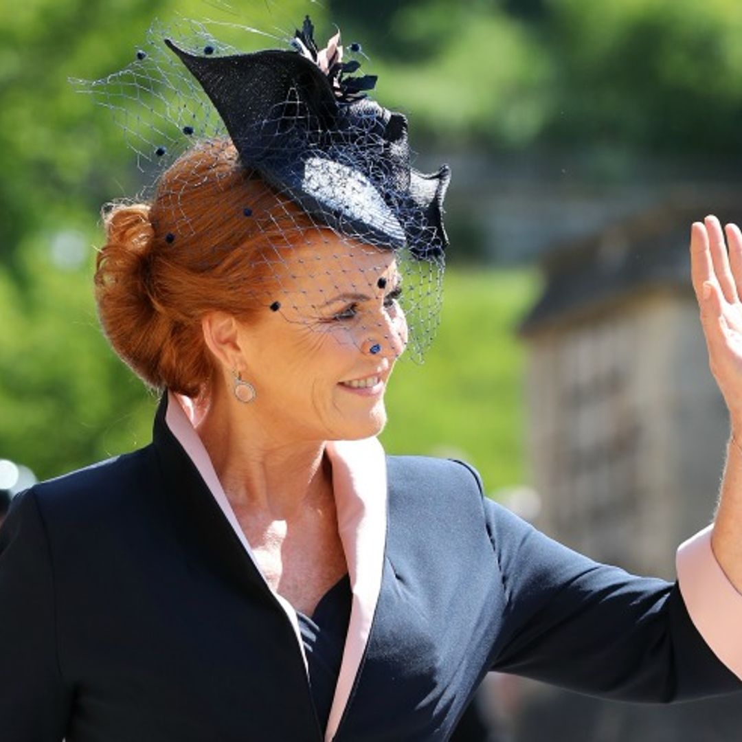 Duchess of York Sarah Ferguson looks chic in navy dress while attending the royal wedding