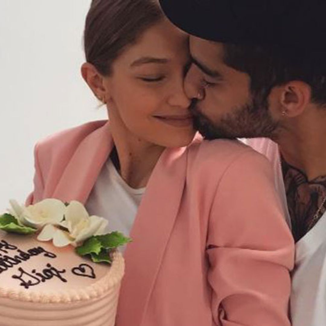 Gigi Hadid receives loving kiss from boyfriend Zayn Malik as she celebrates 22nd birthday