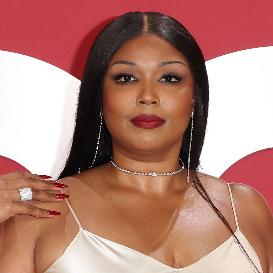 Lizzo wows with curvaceous physique in slinky dress after 60lbs weight loss