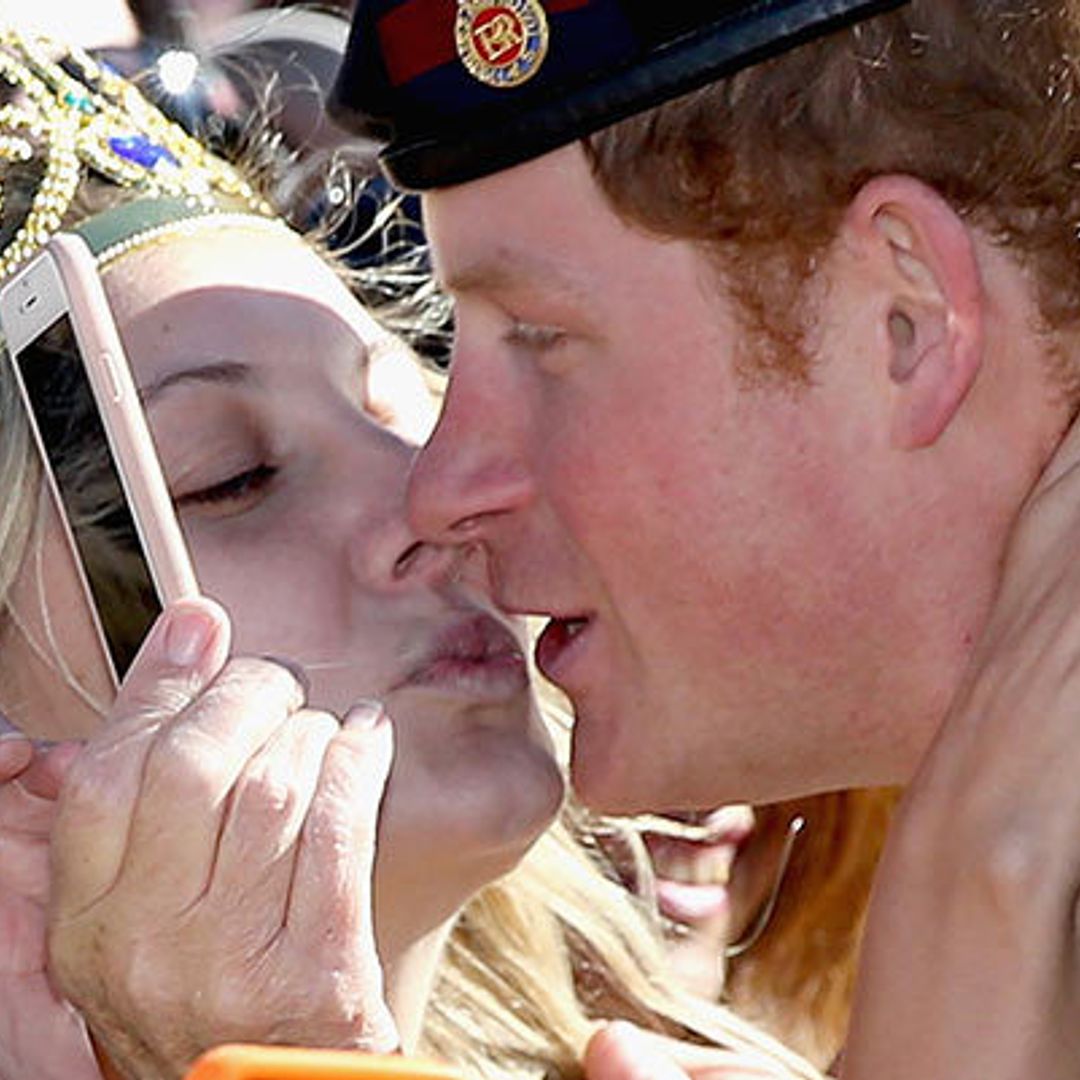 Prince Harry stunned by kiss from fan in Sydney