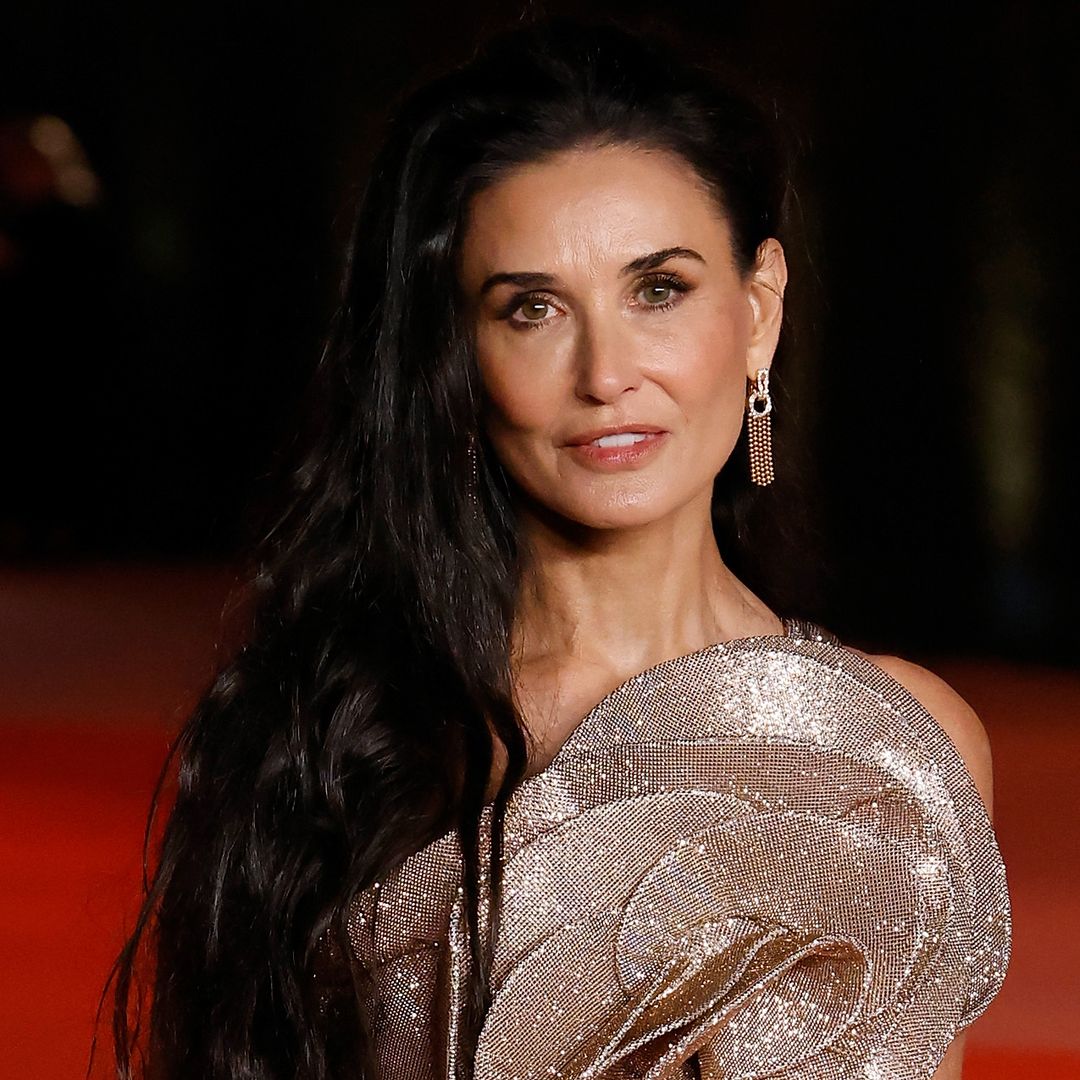 Demi Moore stuns in slick power suit with waist-length hair