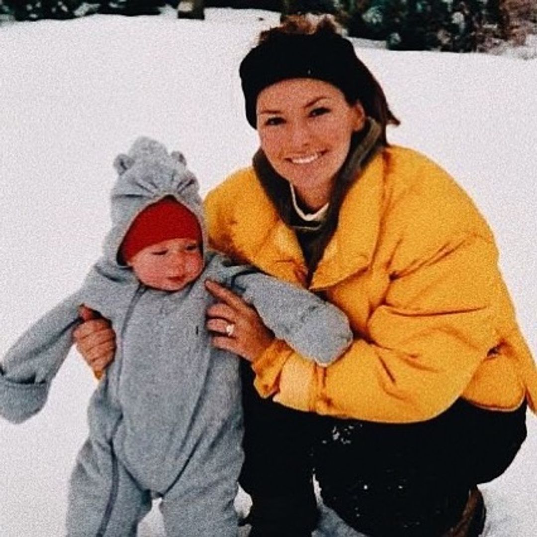 Shania Twain poses in the snow with her son Eja Lange as a baby, shared on Instagram