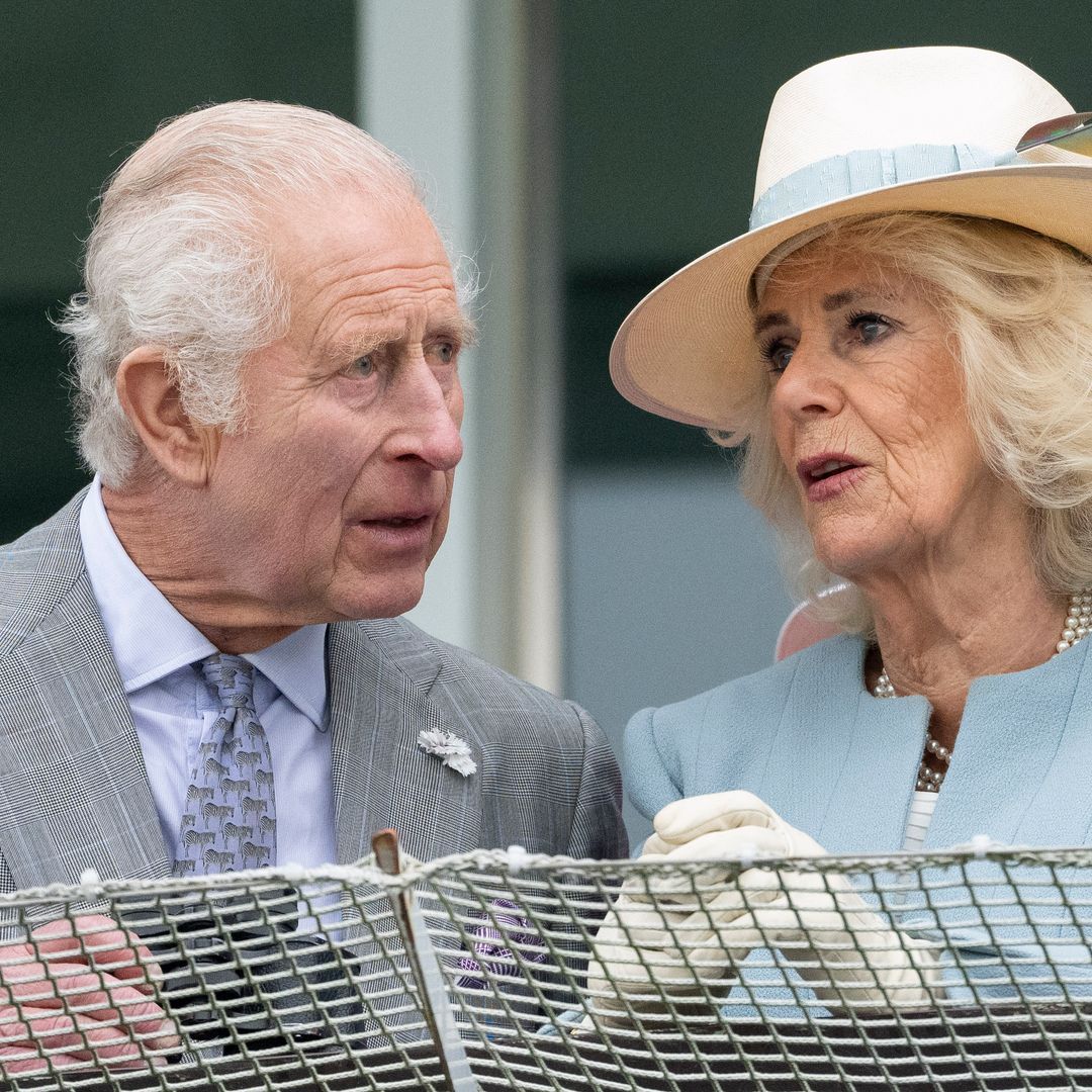 Disappointment for King Charles and Queen Camilla as they brave the rain for day at the races – all the photos