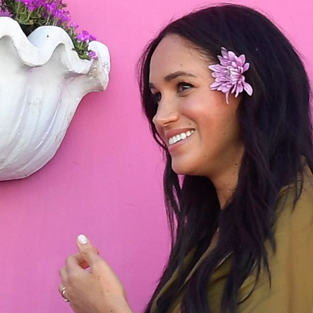 Meghan Markle is a beach babe in scalloped swimsuit in ultra-rare holiday video