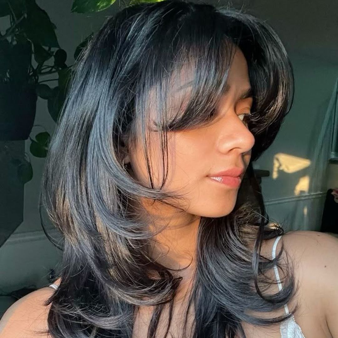 hush layered black haircut 