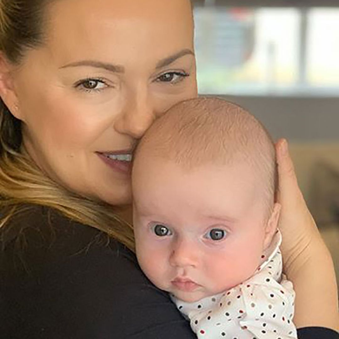 Ola Jordan cuddles sleeping baby Ella - and her £16 Next outfit is so adorable