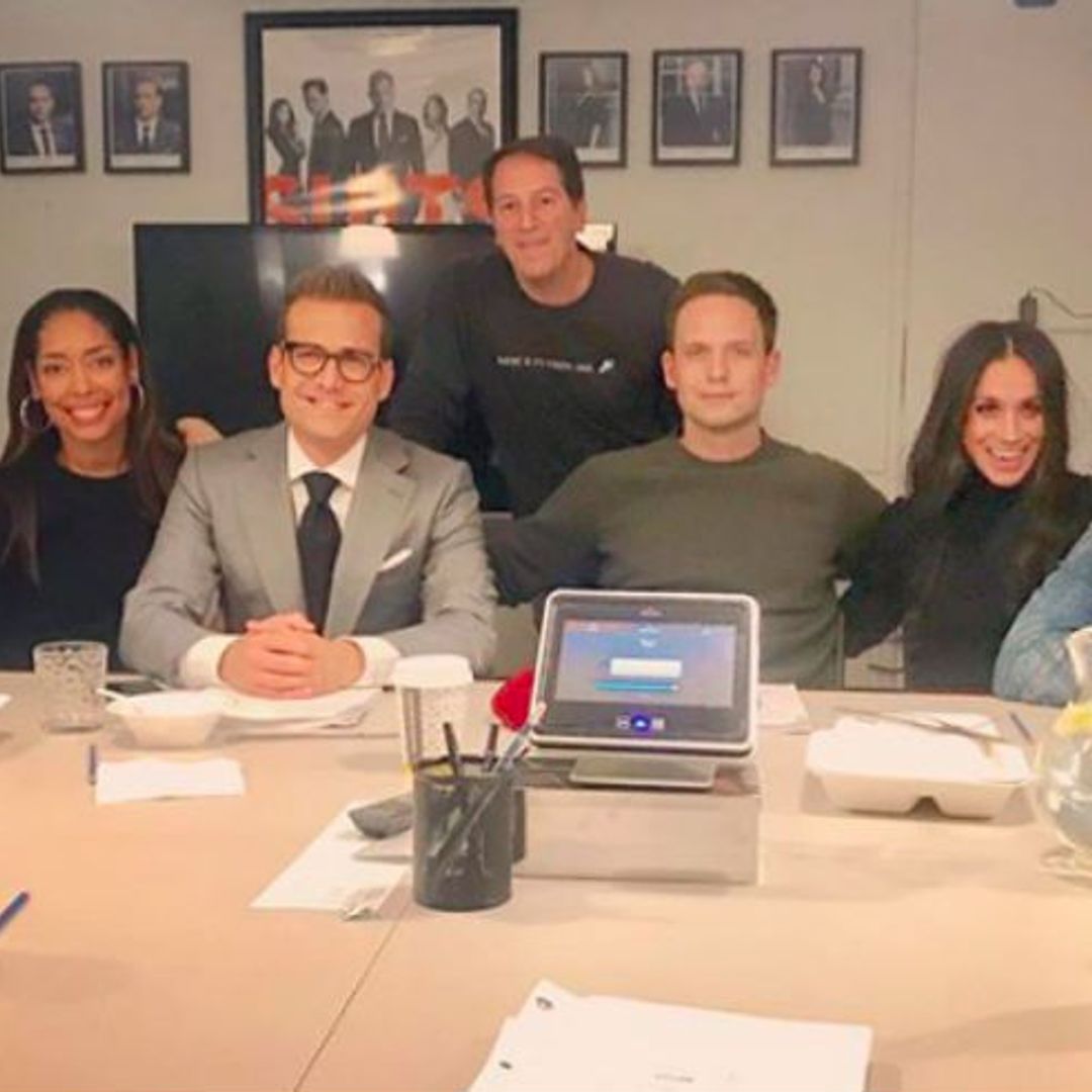 Suits cast pose for group photo - and it might be their last together!