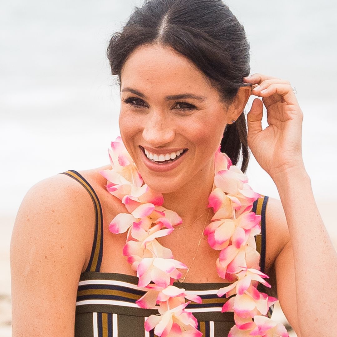 Meghan Markle is an island goddess in dreamy $6.6k beach dress on secret holiday with Prince Harry