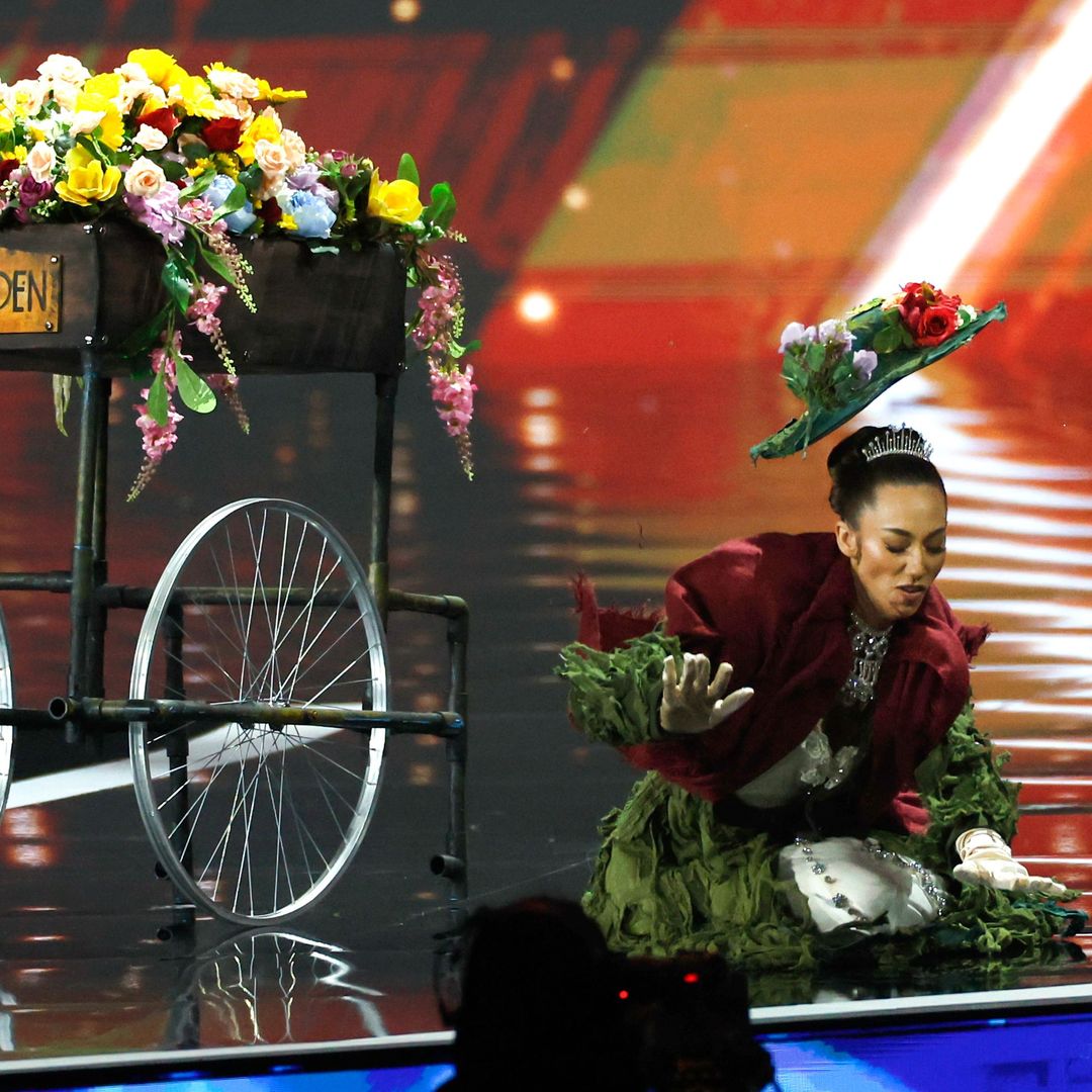 Miss Great Britain Danielle Latimer falls on stage