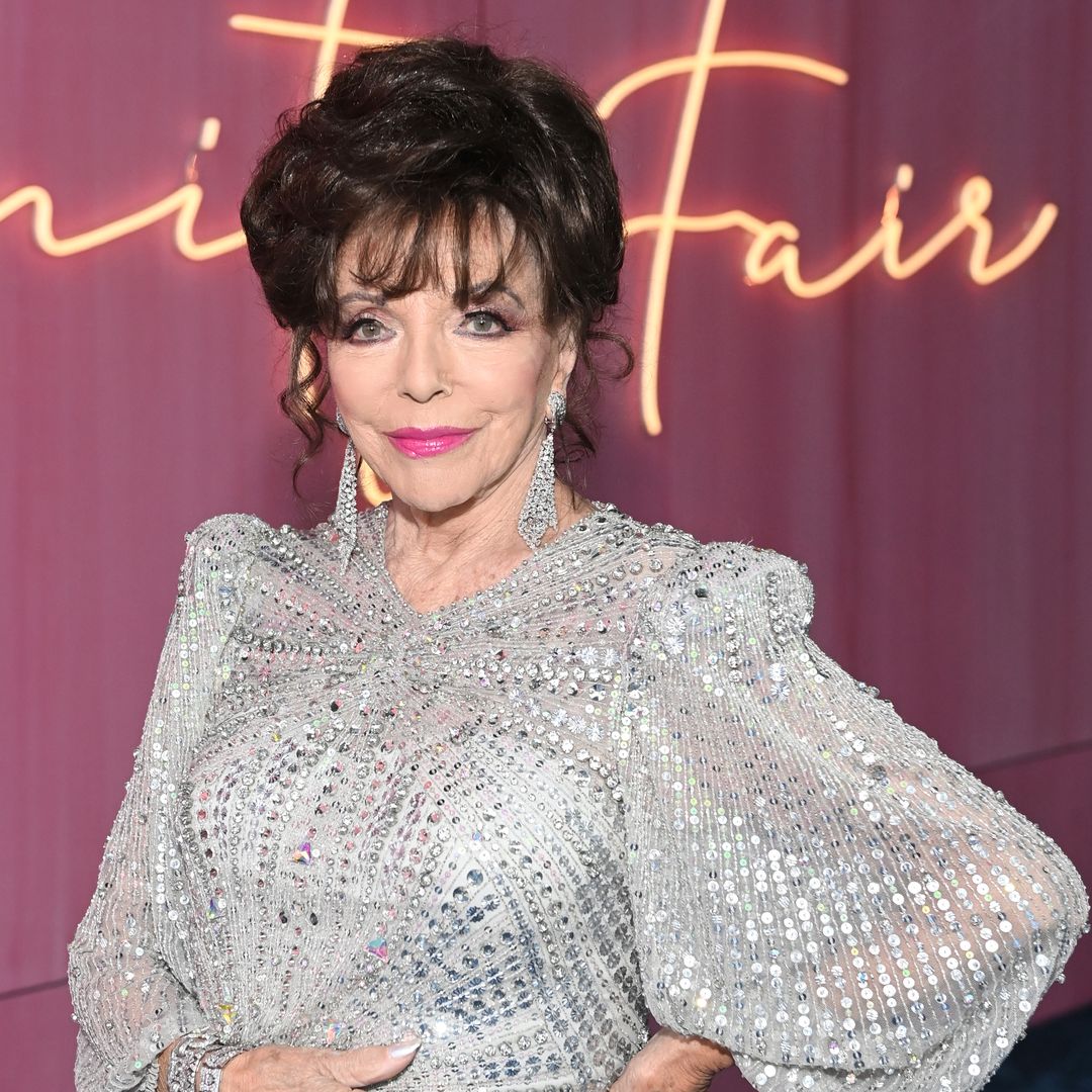 Joan Collins, 90, is the ultimate vixen in daring lacy dress