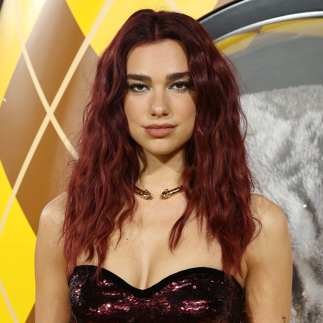 Dua Lipa dazzles in strapless sequin corset dress that's perfect for 2024