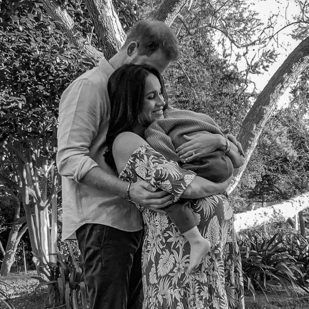 Prince Harry and Meghan Markle cradle Archie and baby bump in new adorable pic