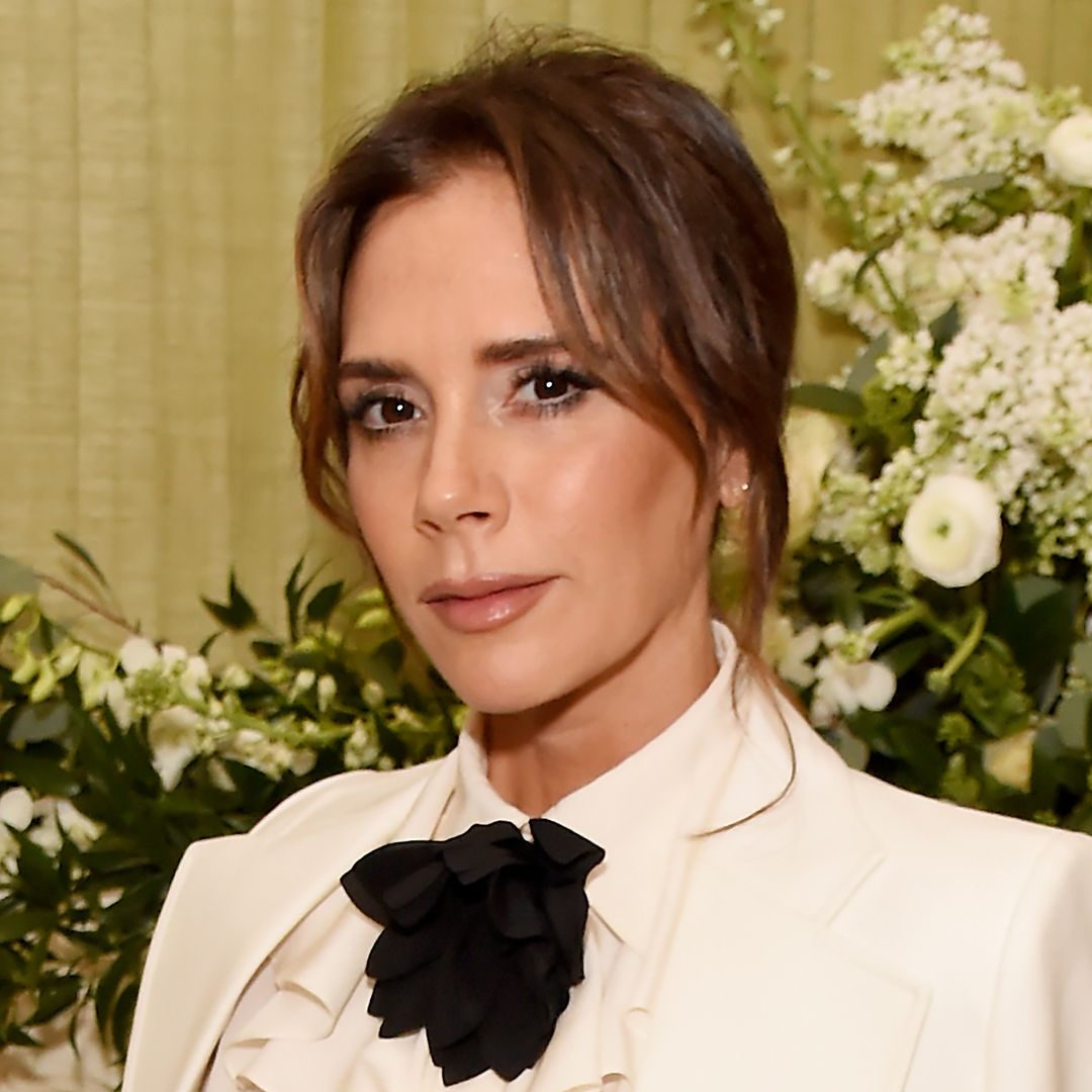 Victoria Beckham is a vision in cinched trousers and the silkiest shirt
