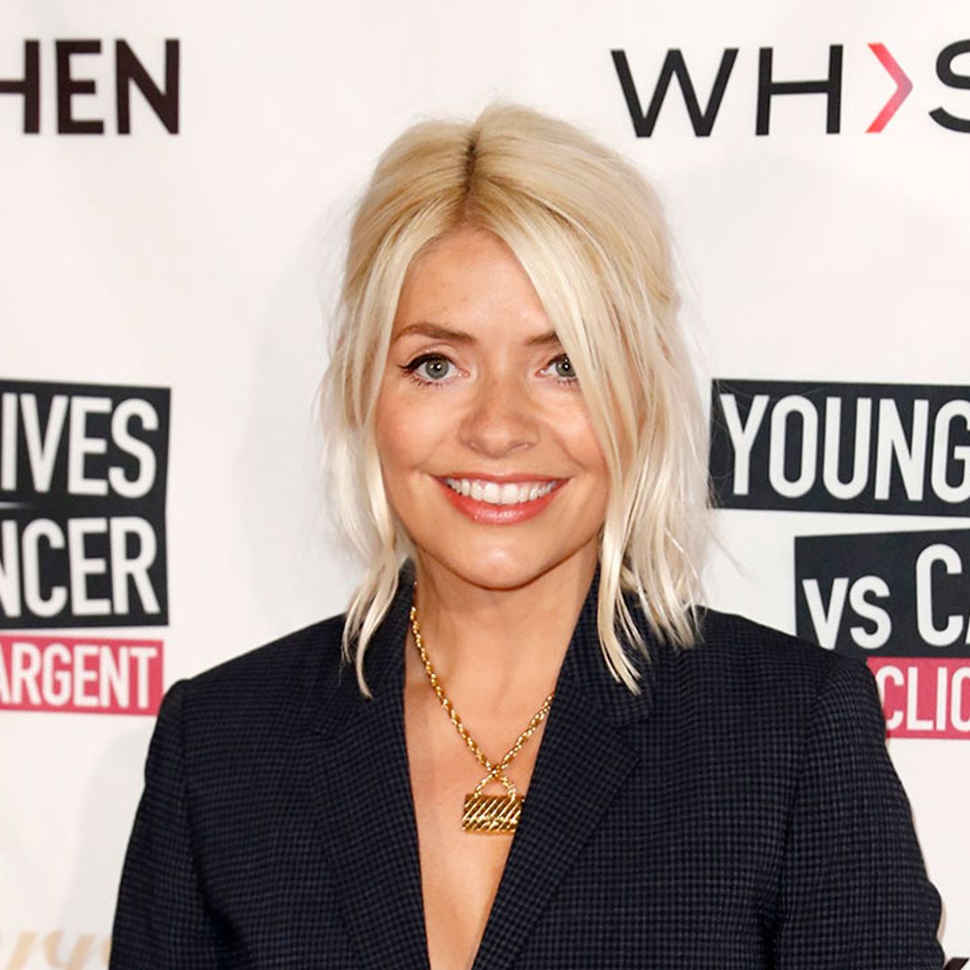 We NEED Holly Willoughby's leather skirt and white heels combo from This Morning