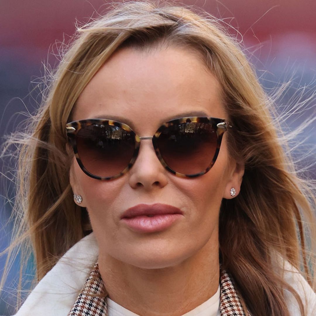 Amanda Holden is a vision in slim-fitting trousers and statement jumper