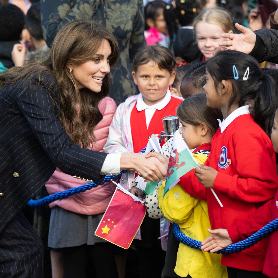 Prince William and Princess Kate bond with schoolchildren as they celebrate Black History Month in Cardiff – best photos