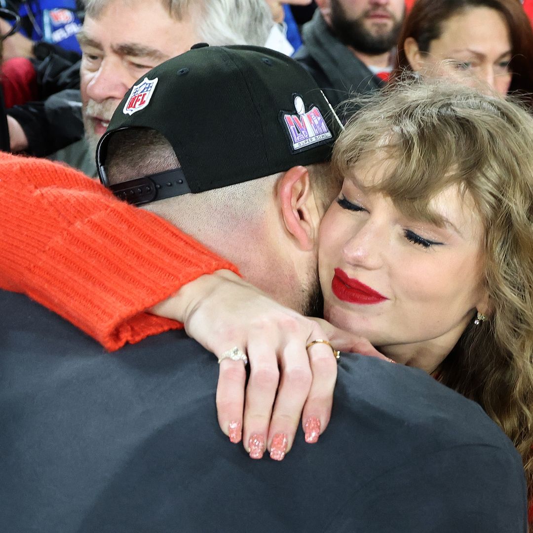 Taylor Swift hugging Travis Kelce 