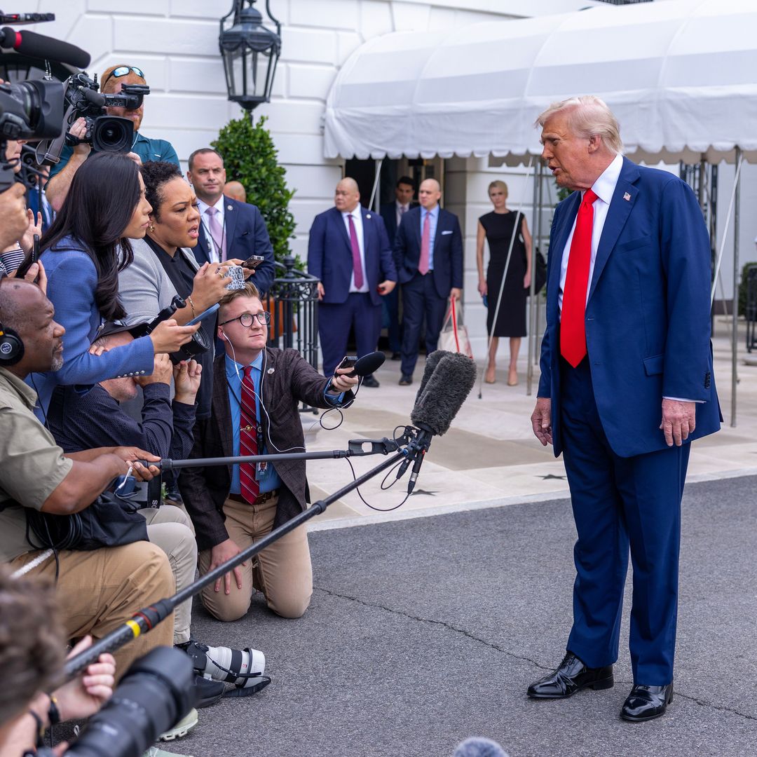 U.S. President Donald Trump talks to the media before boarding Marine One on the South Lawn of the White House on September 21, 2025 in Washington, DC. President Trump will travel to Arizona to pay tribute to conservative activist Charlie Kirk at a memorial and return to the White House this evening