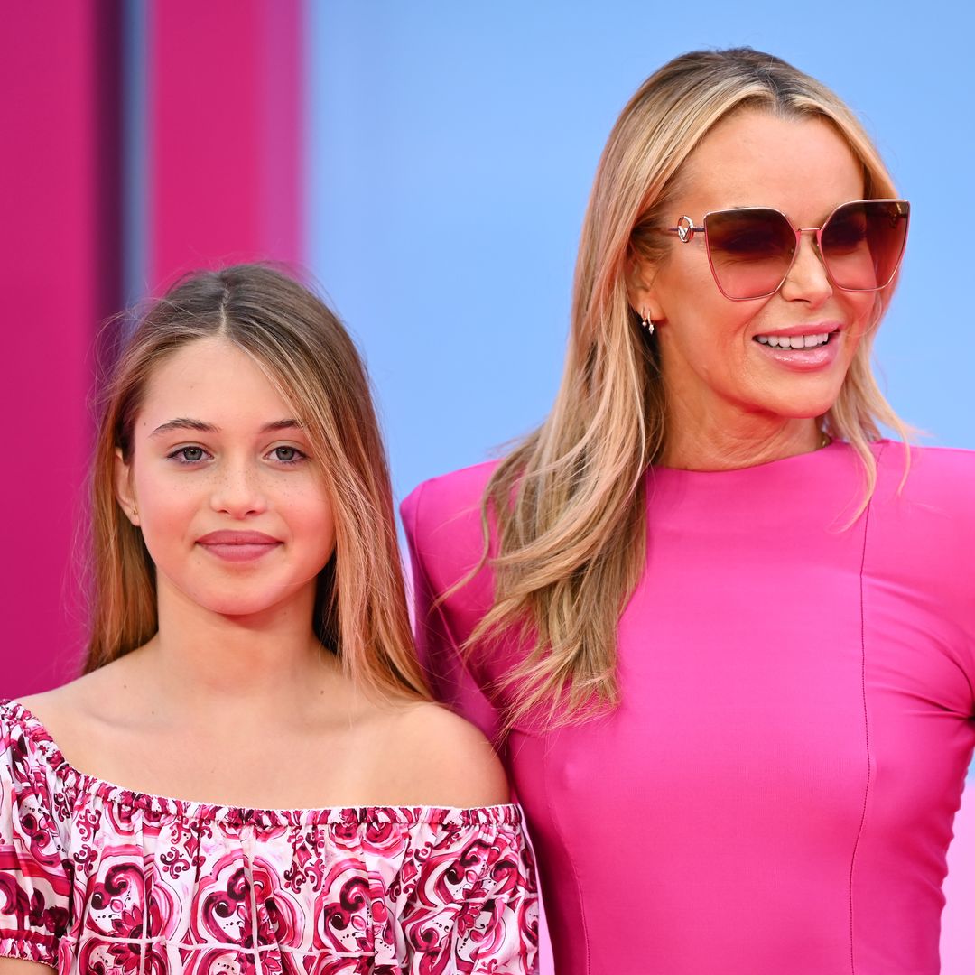 Amanda Holden sizzles in hot pink alongside daughter Hollie for rare red carpet appearance - and they could be twins