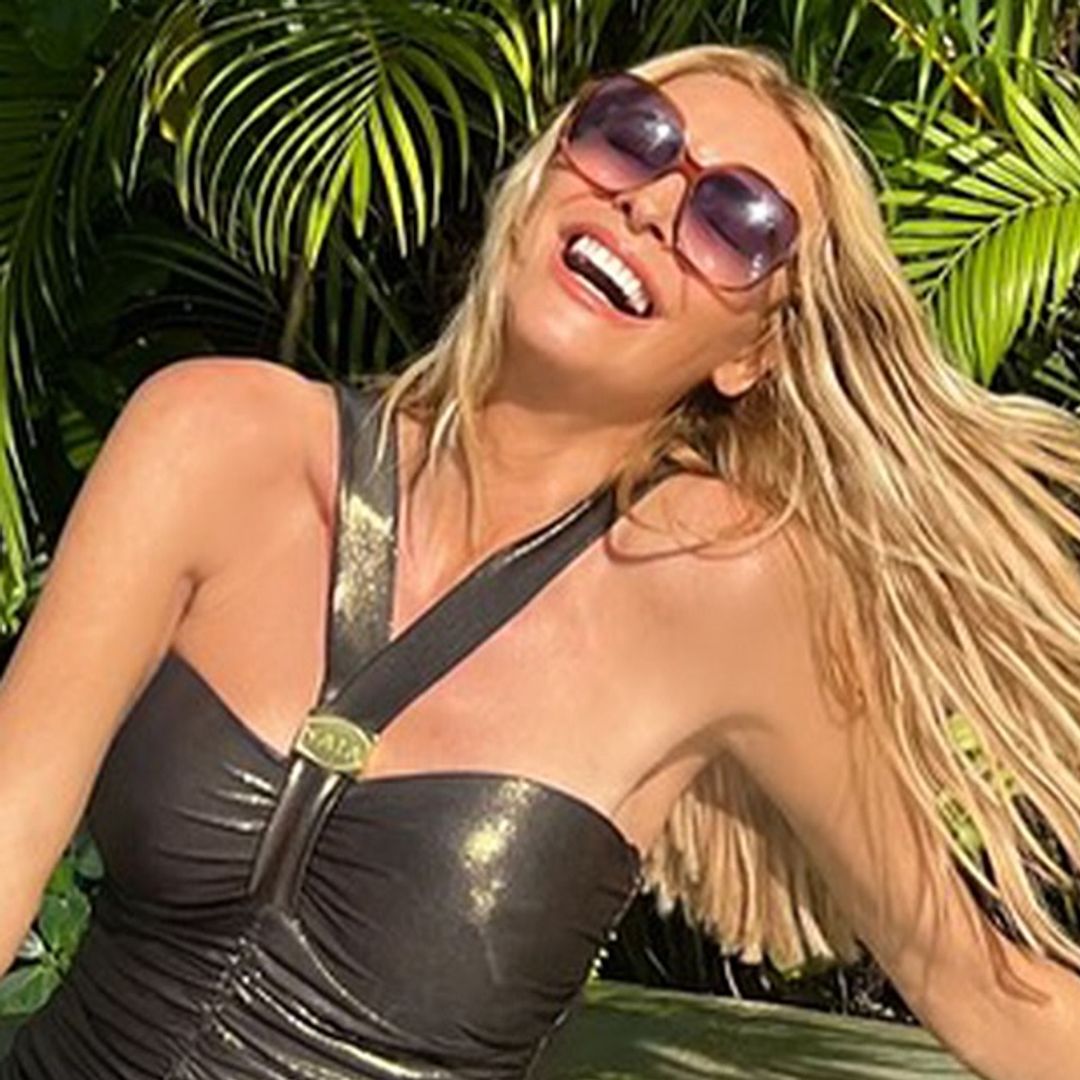 Strictly's Tess Daly looks statuesque in strapless bikini and thigh-split mesh dress