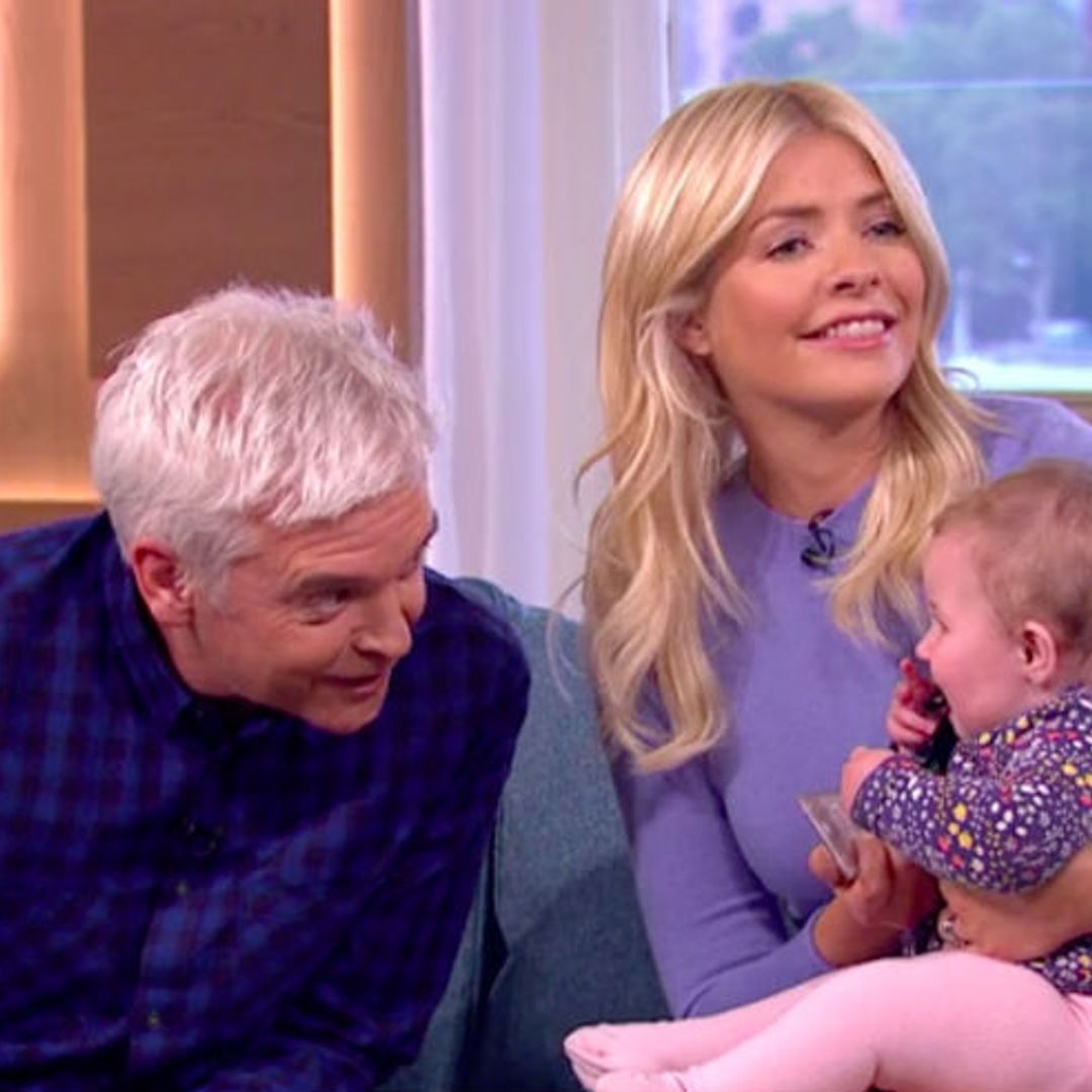 Holly Willoughby appears broody after cuddling 'miracle baby'