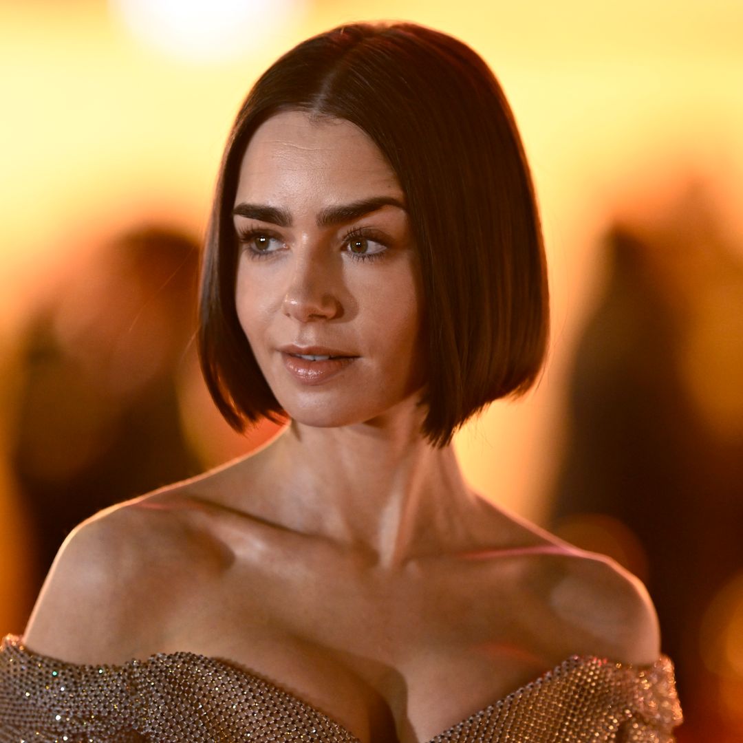 Lily Collins looks like a debutante in sparkling corset dress