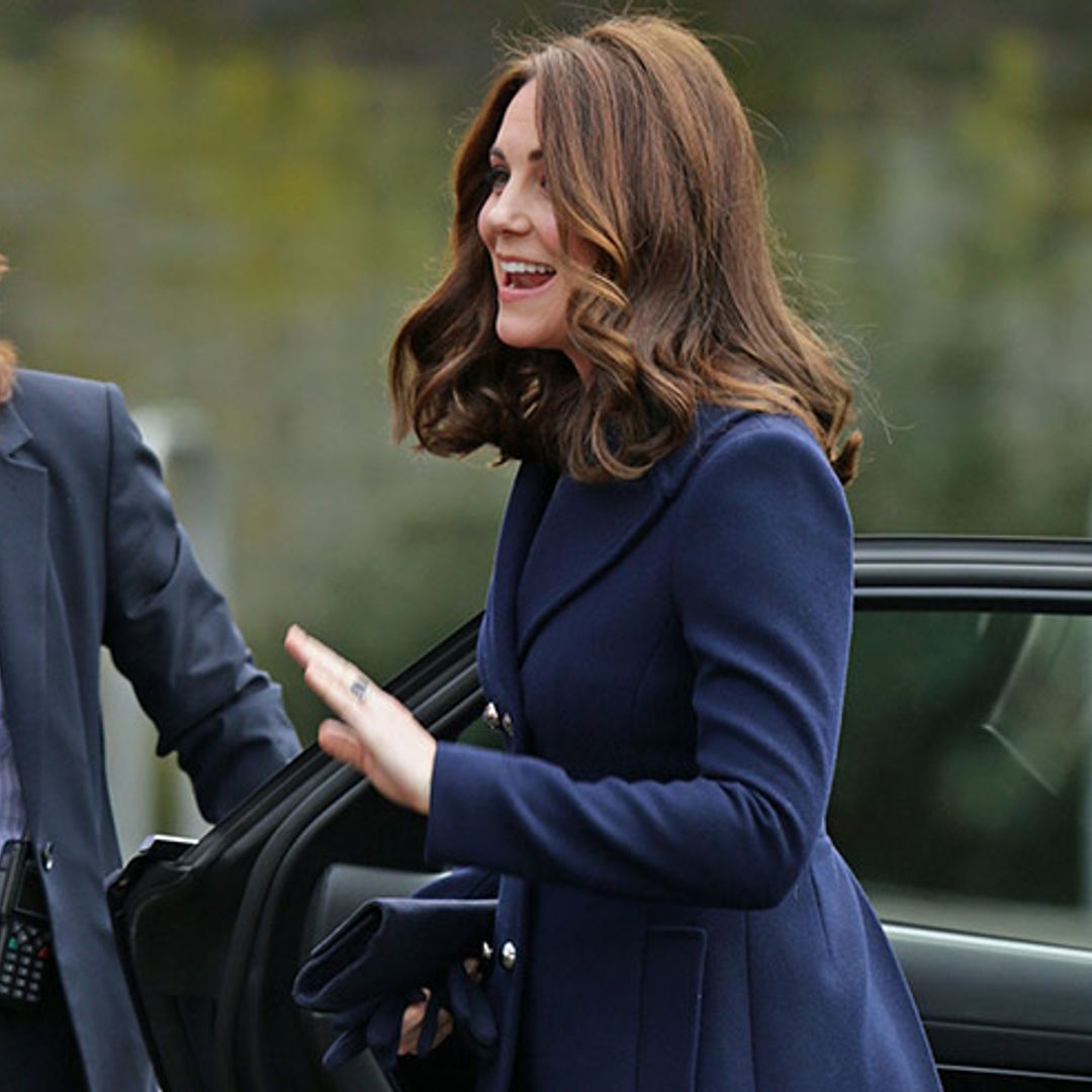 Duchess Kate braves the cold in navy Hobbs coat