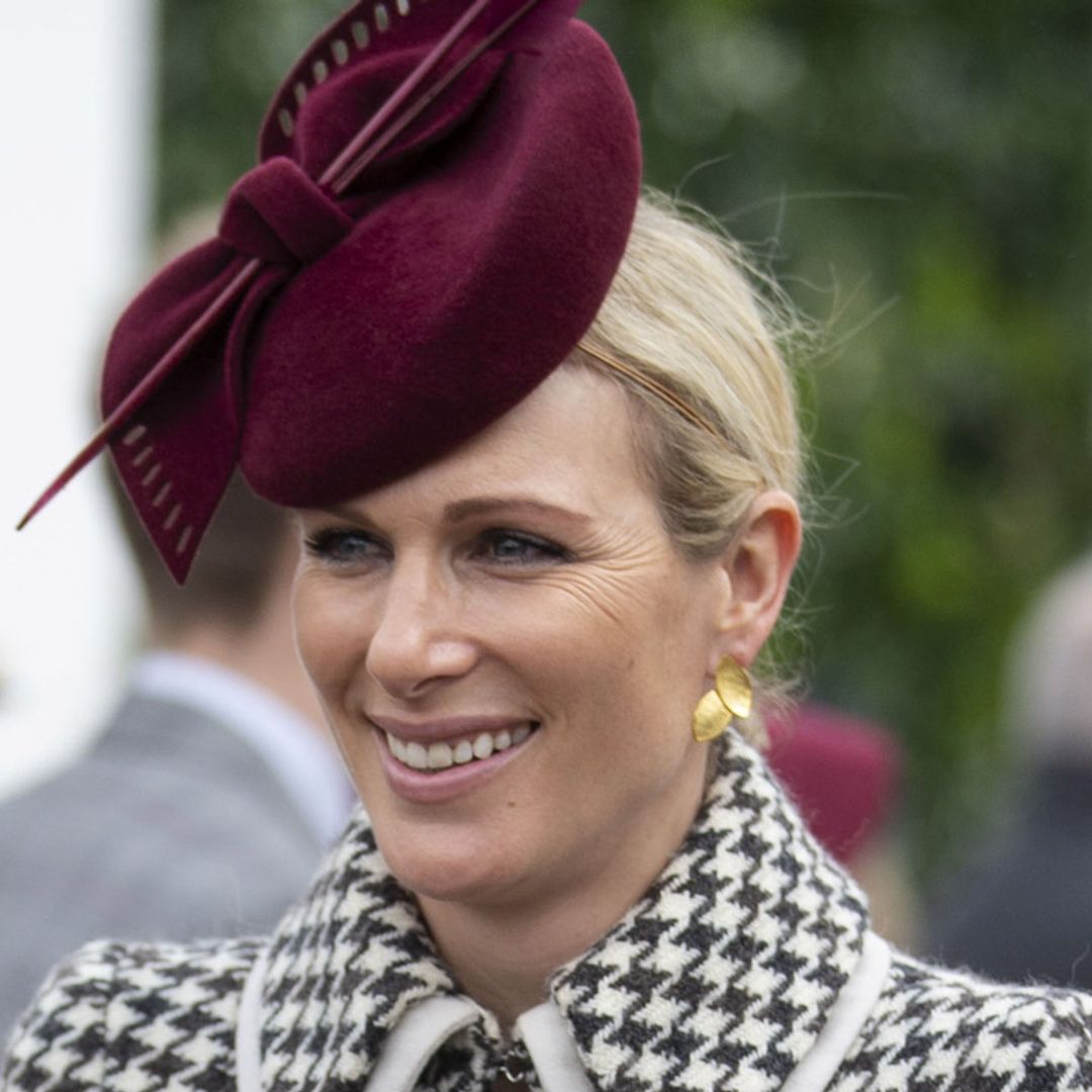 Zara Tindall wows in a houndstooth coat and satin dress at Cheltenham Festival