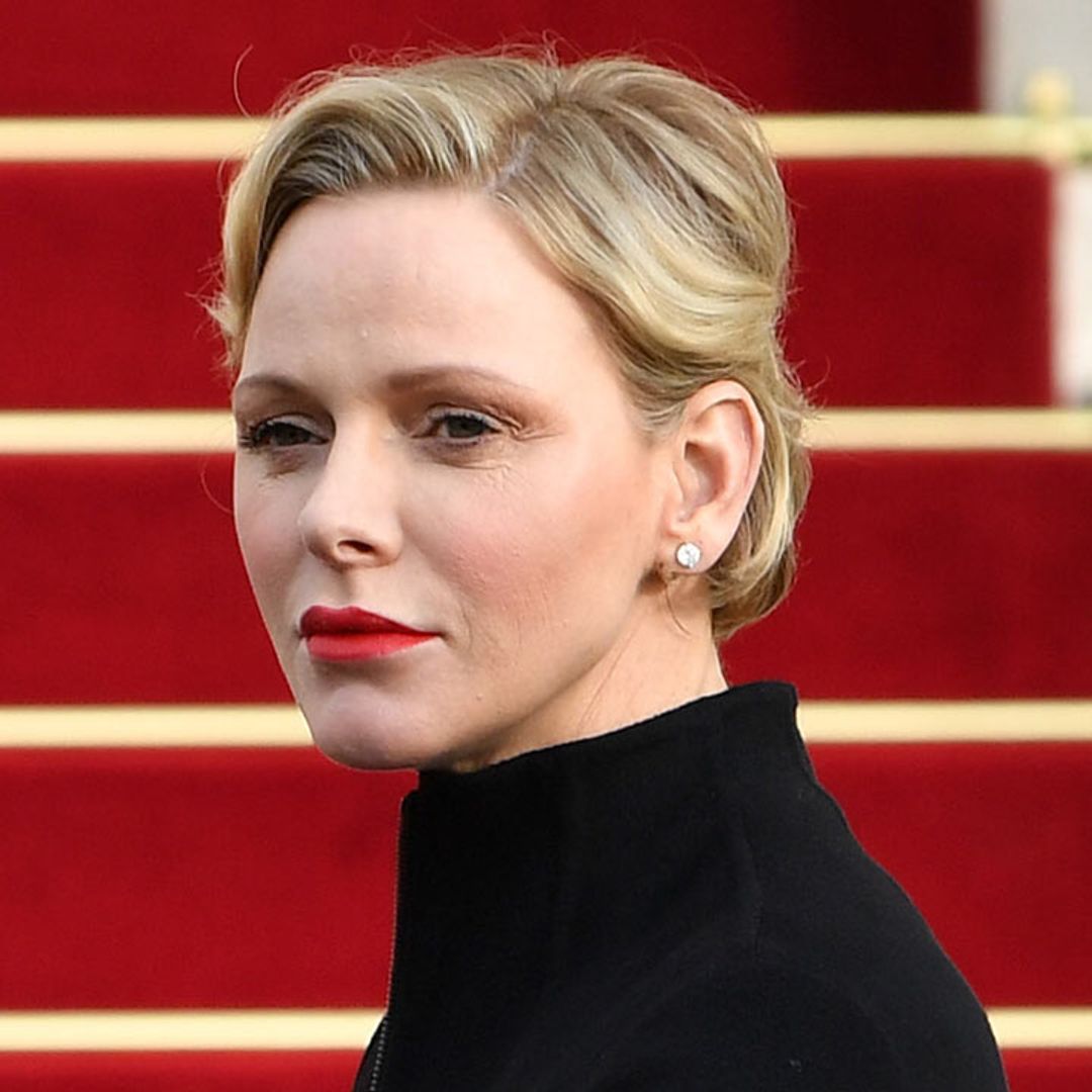 Princess Charlene wows crowds in all-black outfit and thigh-high boots
