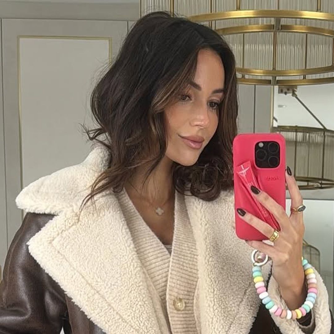 Pregnant Michelle Keegan snuggles up on white plush sofa in £3.5 million home