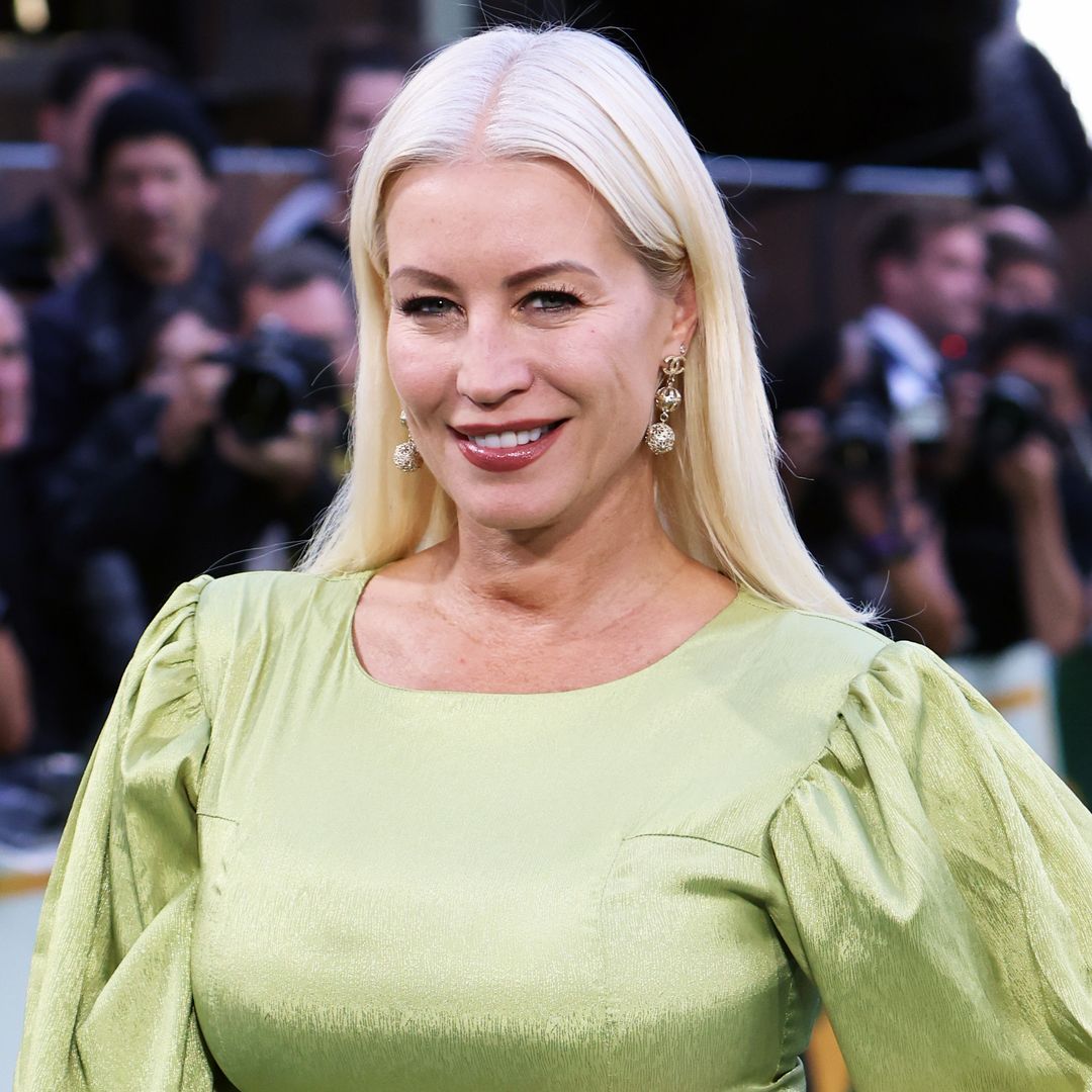 Denise van Outen resembles a goddess in daring plunging swimsuit