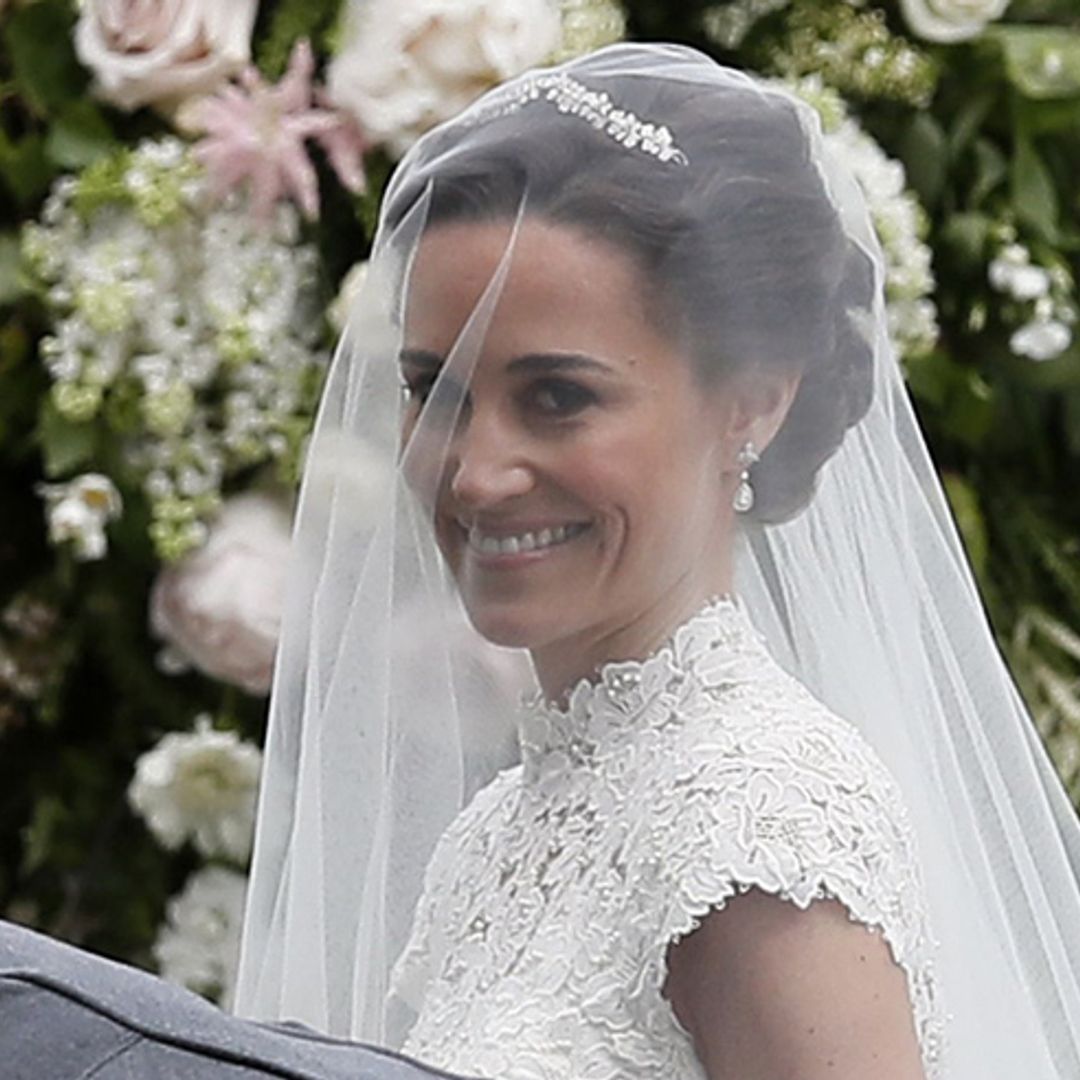 Blushing bride Pippa Middleton arrives for wedding with dad Michael