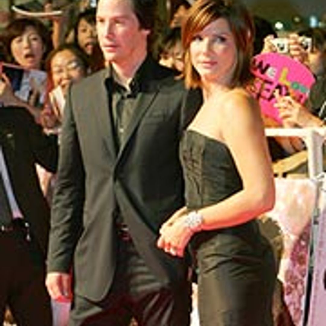 Keanu and Sandra receive love-letter shower in Tokyo