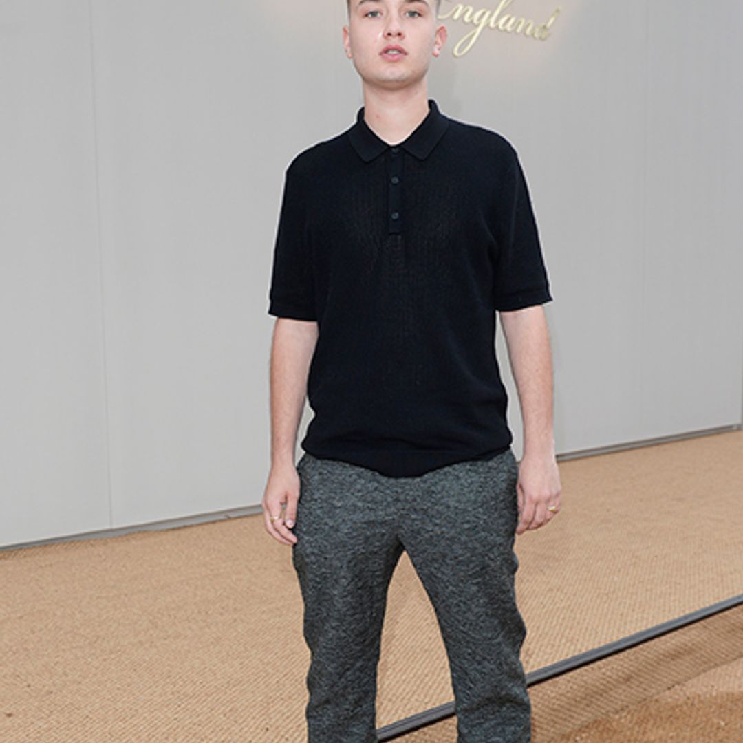 Brooklyn Beckham enjoys the Burberry LCM show from the front row